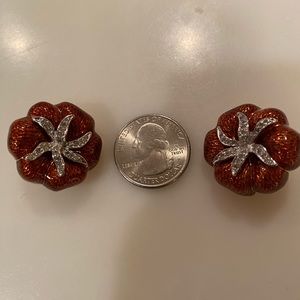 Judith Leinen clip on earrings orange color. One size.